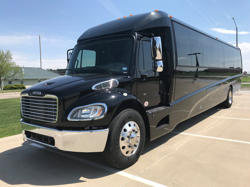 32 passenger black party bus! Used for any type of luxurious transportation including weddings, birthdays, bachelor/bachelorette groups and much, much more!